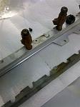 exposed fuel rail with bracket removed